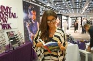Carola in black reading glasses (mod. BRONX) from Jimmy Crystal.
