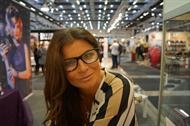Carola in crystal black reading glasses (mod. BRONX) with black Swarovski crystals.